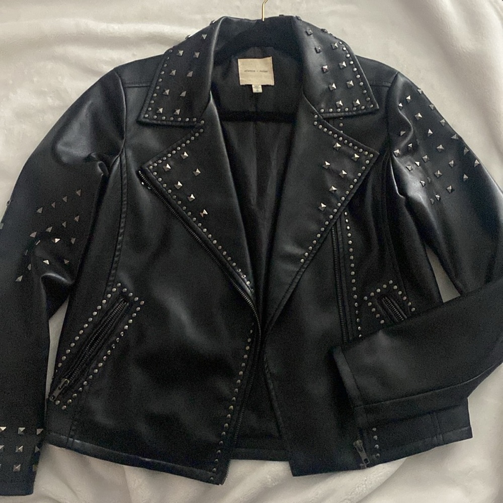 Black studded leather jacket with floral embroidered back